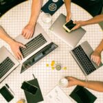 top view of people collaborating at a table top